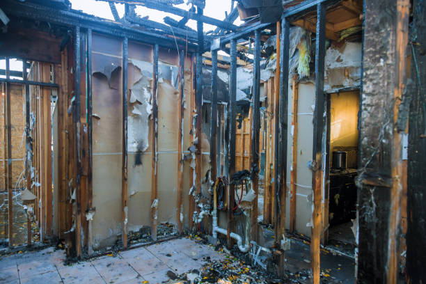 Professional Fire Damage Restoration technician working in Cambridge, WI